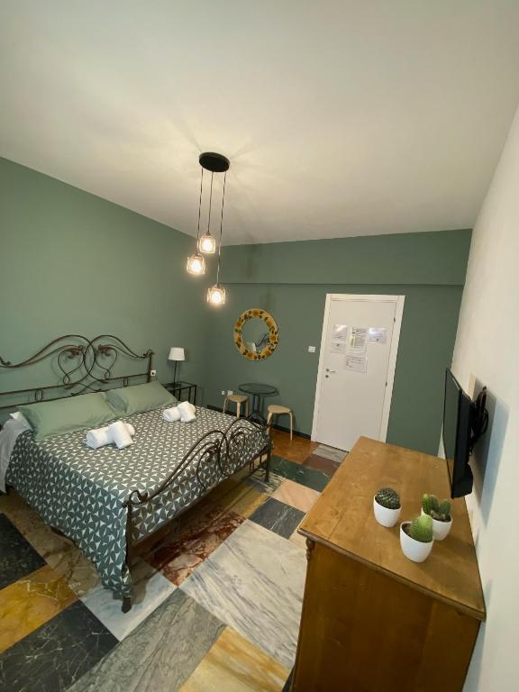 Łóżko lub łóżka w pokoju w obiekcie Delle Rose Rooms