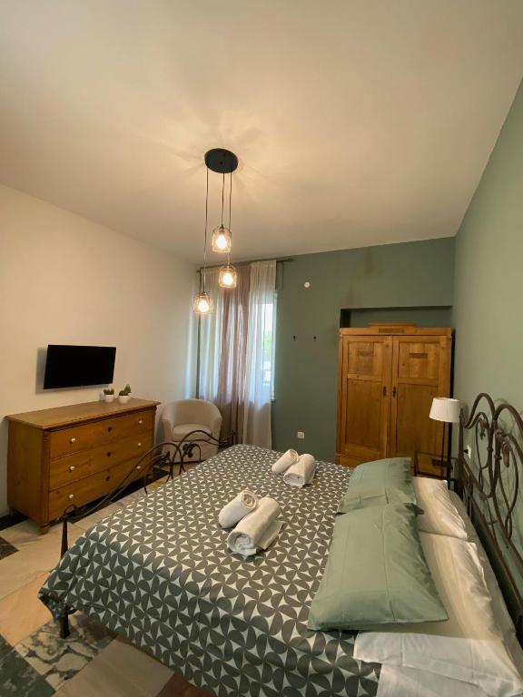 Łóżko lub łóżka w pokoju w obiekcie Delle Rose Rooms