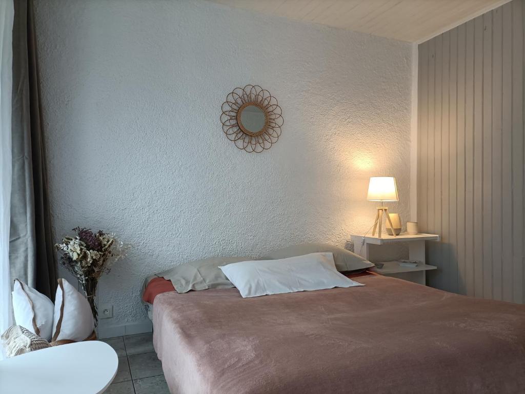 Posteľ alebo postele v izbe v ubytovaní Charmant Appartement Bord de mer