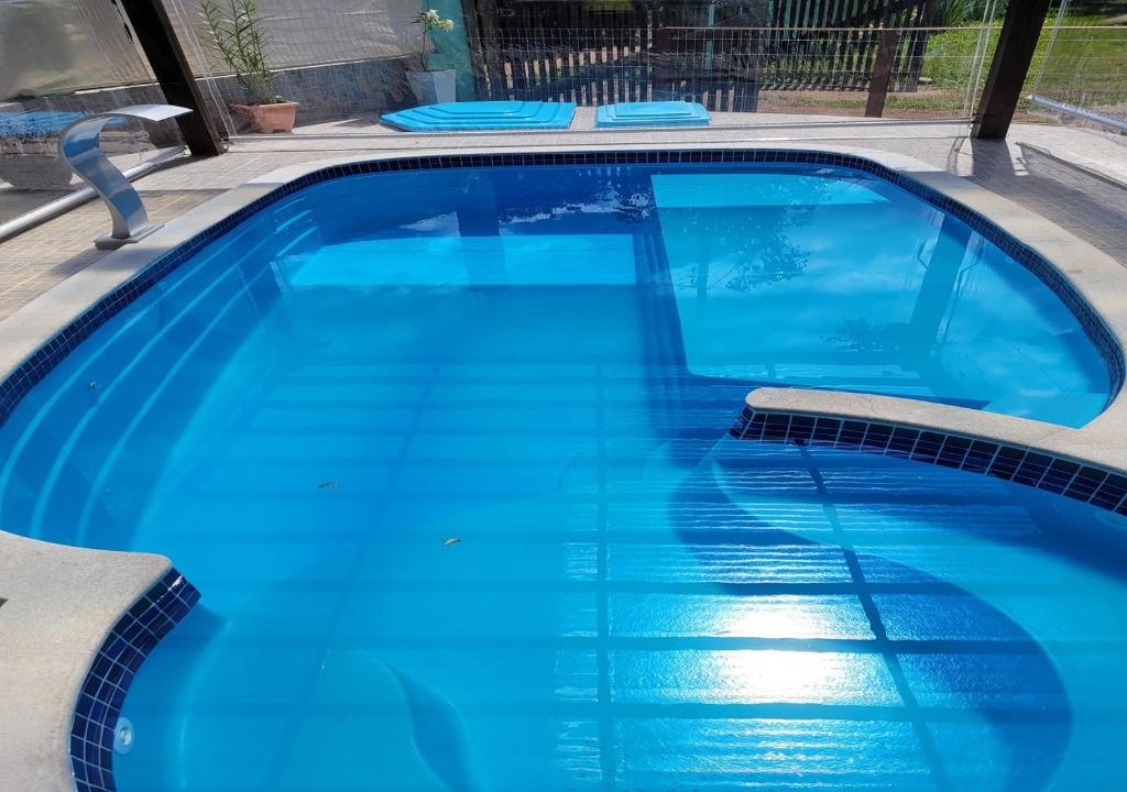 Bazén v ubytování Flat Dona Branca nebo v jeho okolí