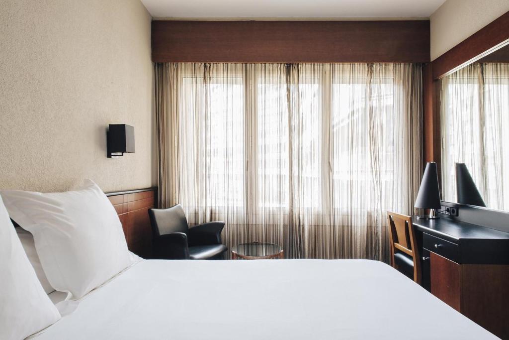 Posteľ alebo postele v izbe v ubytovaní Hotel Derby