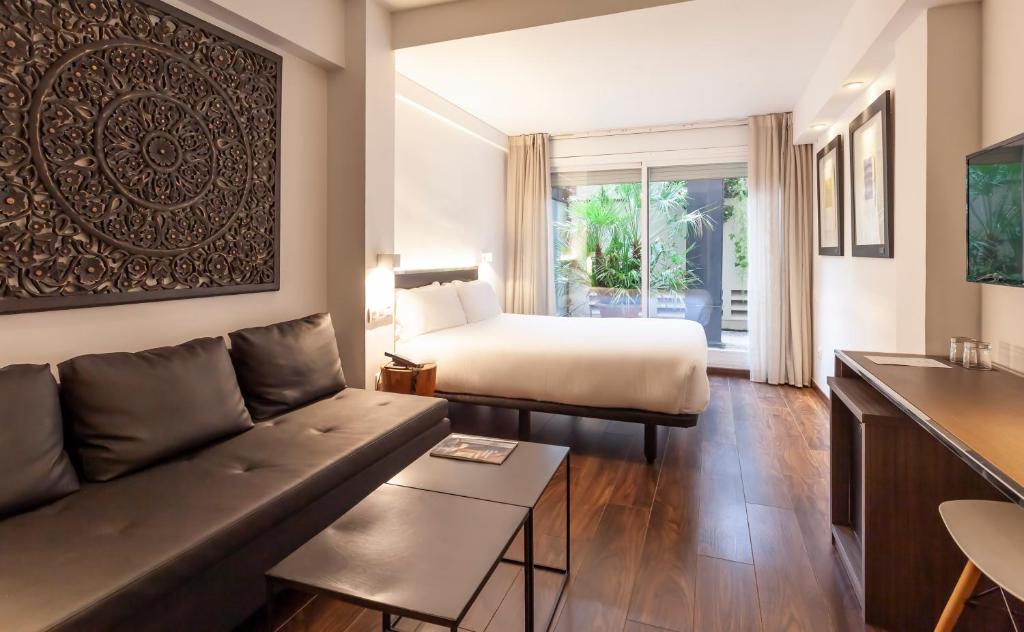 Posteľ alebo postele v izbe v ubytovaní Hotel Derby