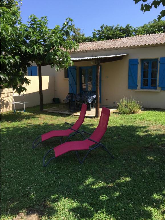 Vonkajšia záhrada v ubytovaní Appartements bord de mer - Accès privé à la plage