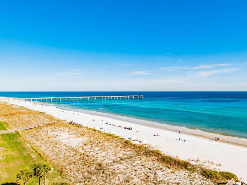 an aerial view of a beach with a pier at The Pearl Of Navarre 705 in Navarre