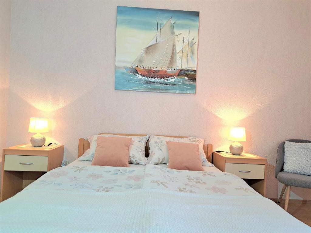 Letto o letti in una camera di Rooms Irena Gregov