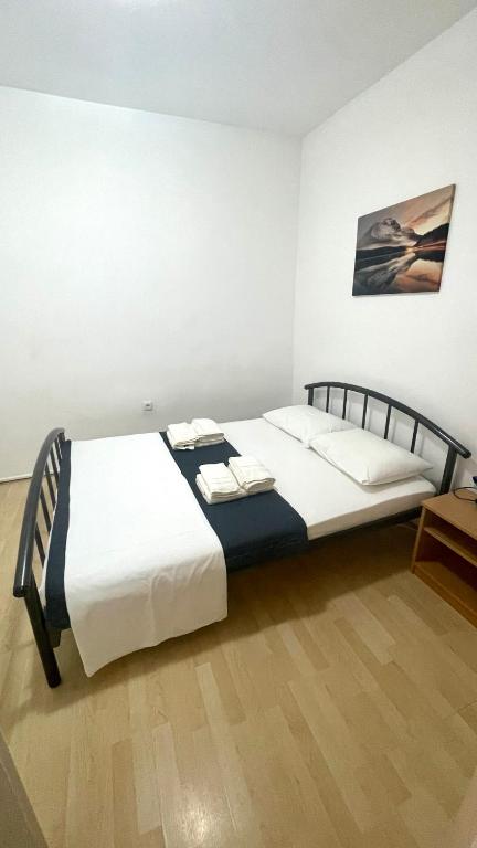 Postel nebo postele na pokoji v ubytování Slanica Mak