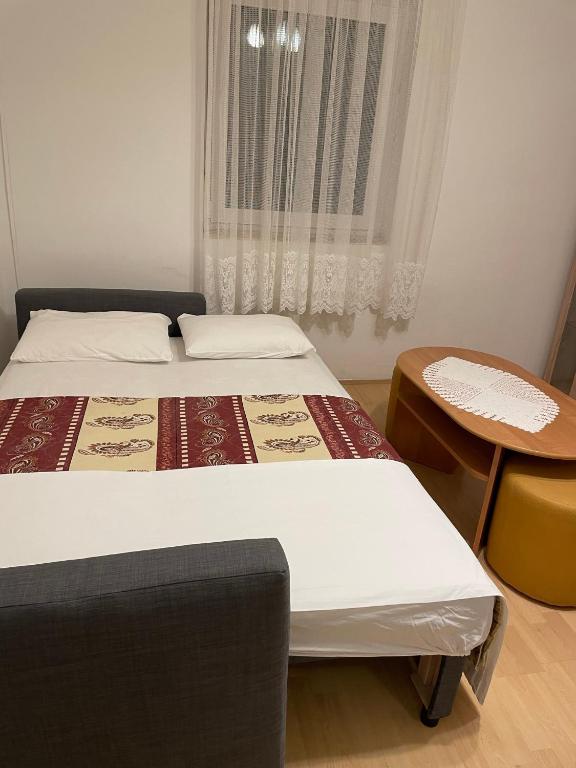 Postel nebo postele na pokoji v ubytování Slanica Mak