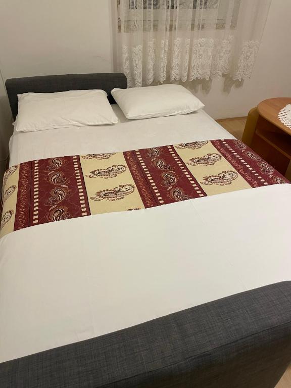 Postel nebo postele na pokoji v ubytování Slanica Mak