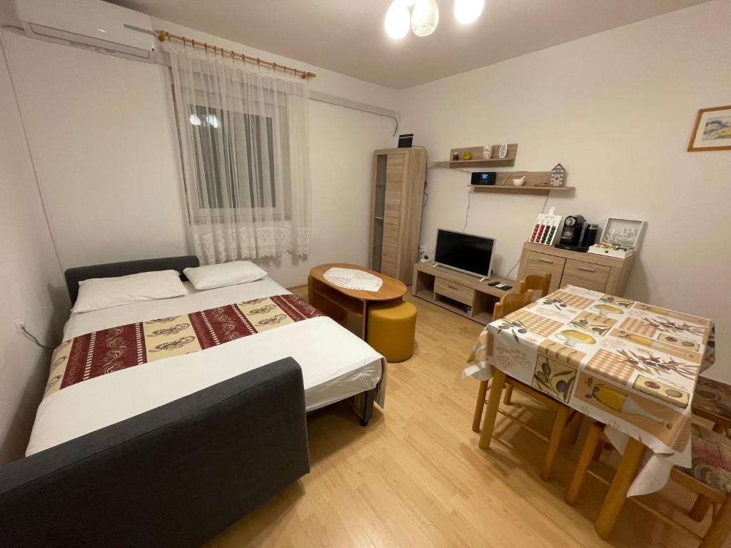 Postel nebo postele na pokoji v ubytování Slanica Mak