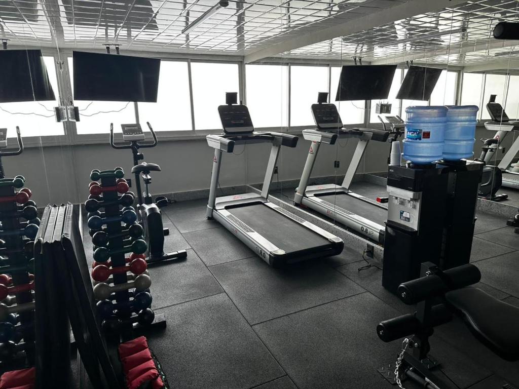 Fitness centrum a/nebo fitness zařízení v ubytování Savassi Hotel