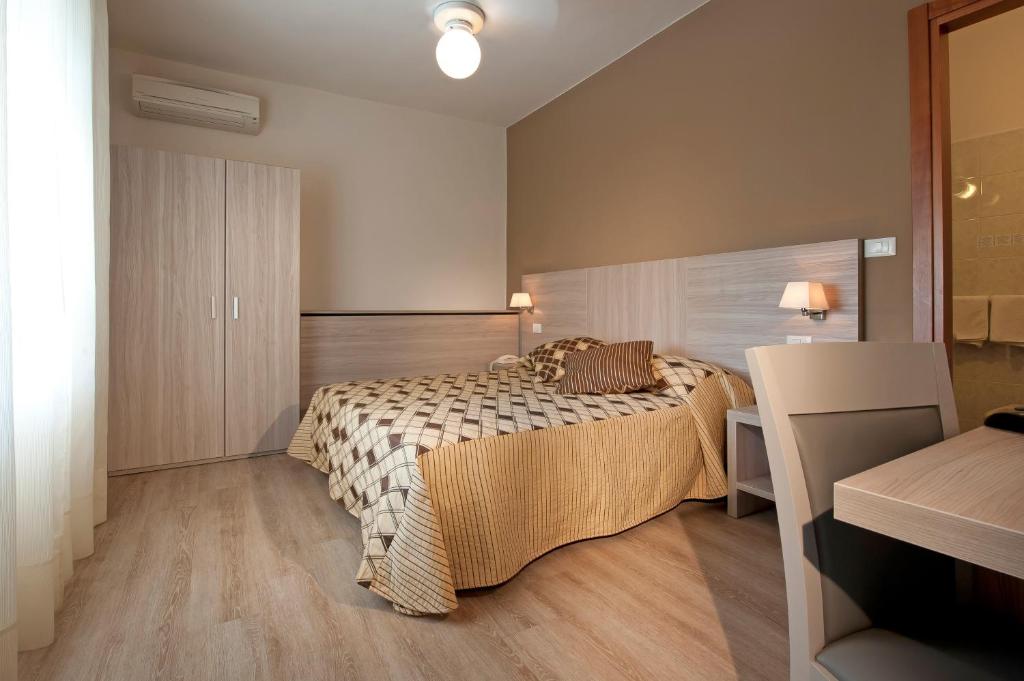 Albergo Valentinaにあるベッド