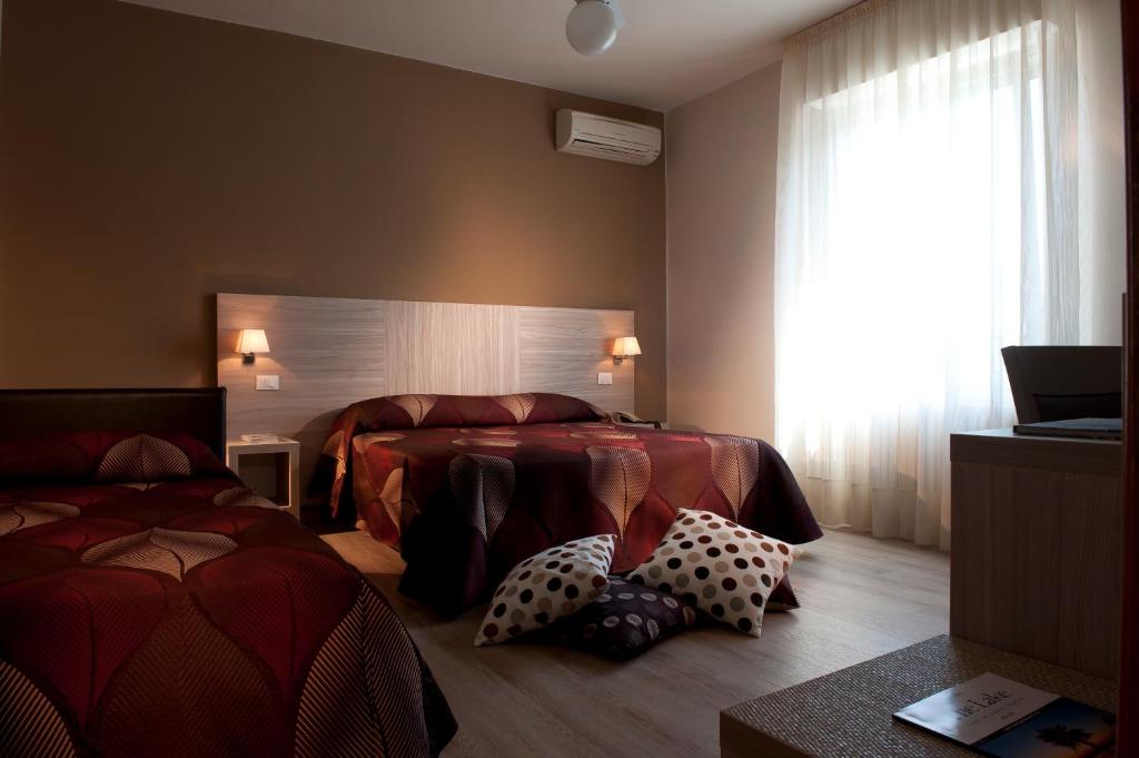 Albergo Valentinaにあるベッド