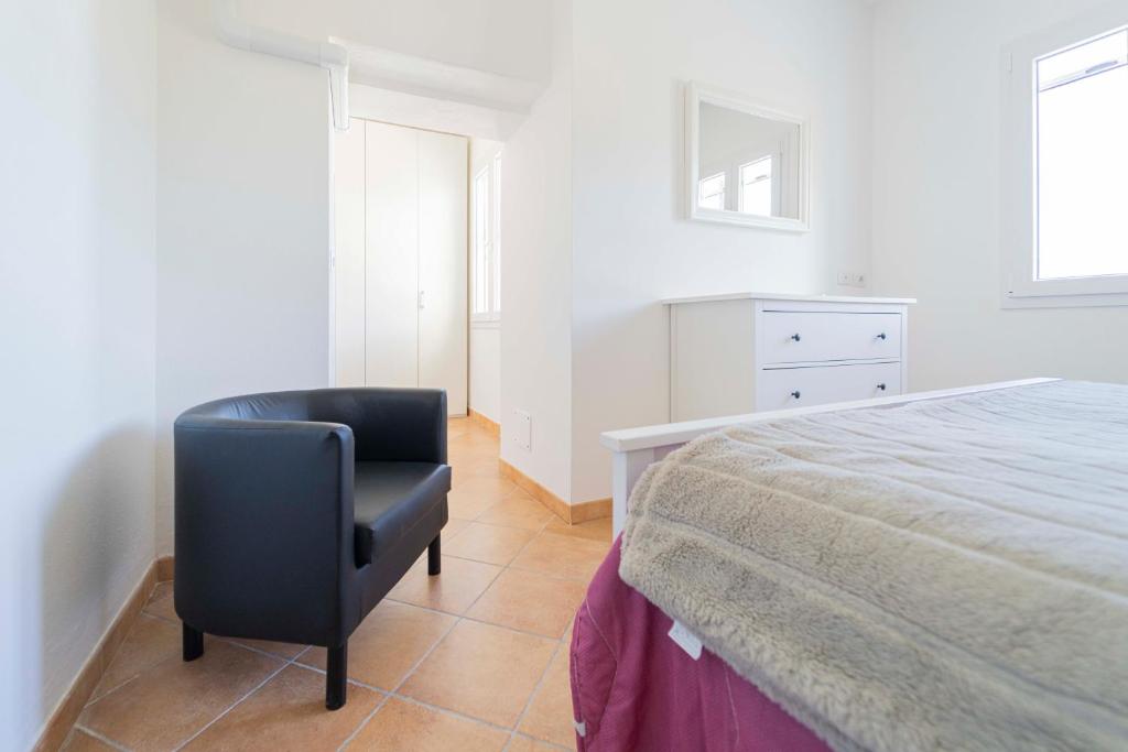 Posteľ alebo postele v izbe v ubytovaní CASA VACANZA IL PORTICO