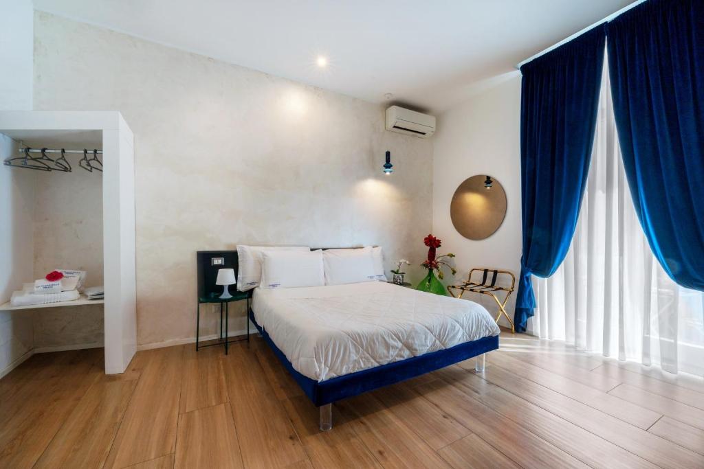 A bed or beds in a room at Le Marinelle Aff Trani