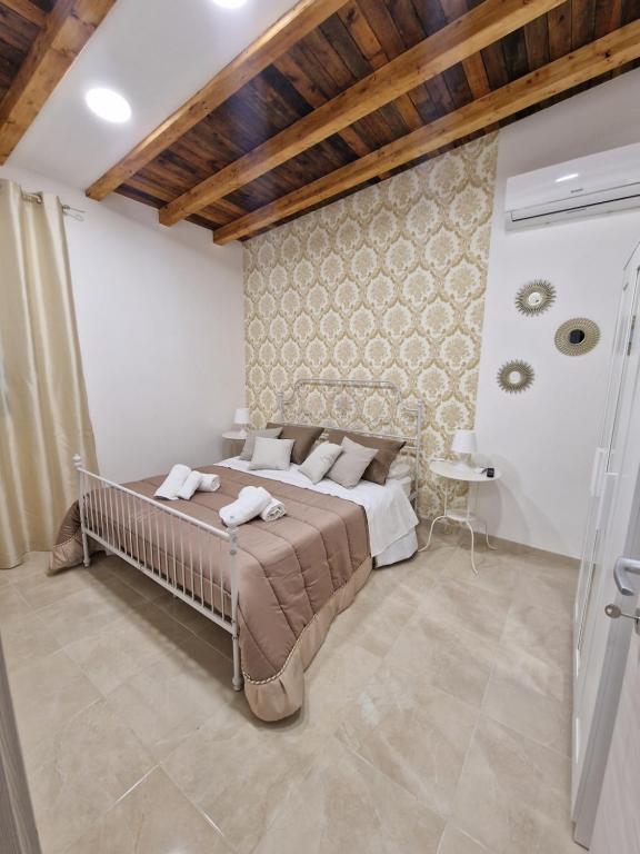 Un pat sau paturi într-o cameră la Dreams's house