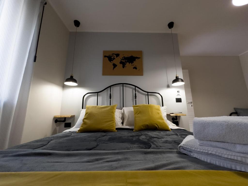 Postel nebo postele na pokoji v ubytování Nicarè Rooms