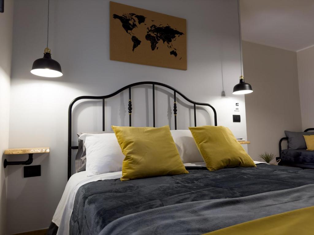 Postel nebo postele na pokoji v ubytování Nicarè Rooms