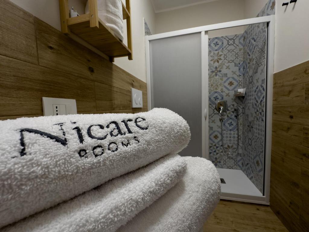 Koupelna v ubytování Nicarè Rooms