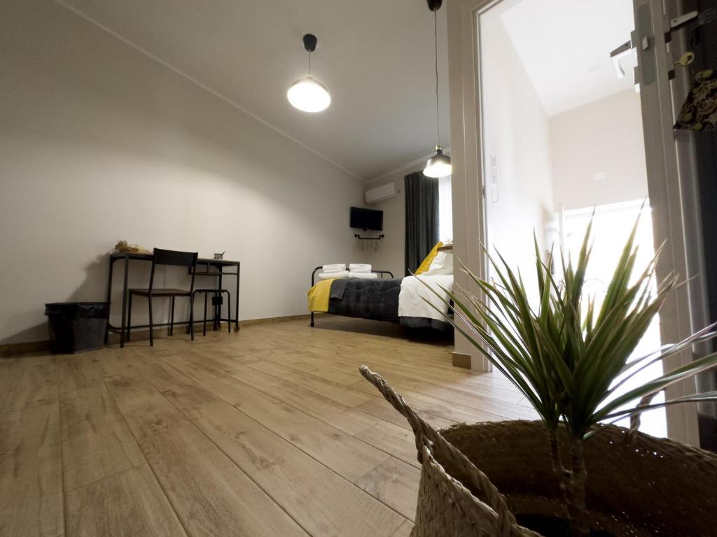 Postel nebo postele na pokoji v ubytování Nicarè Rooms
