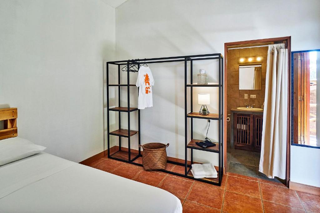 Postel nebo postele na pokoji v ubytování Casa Calocita