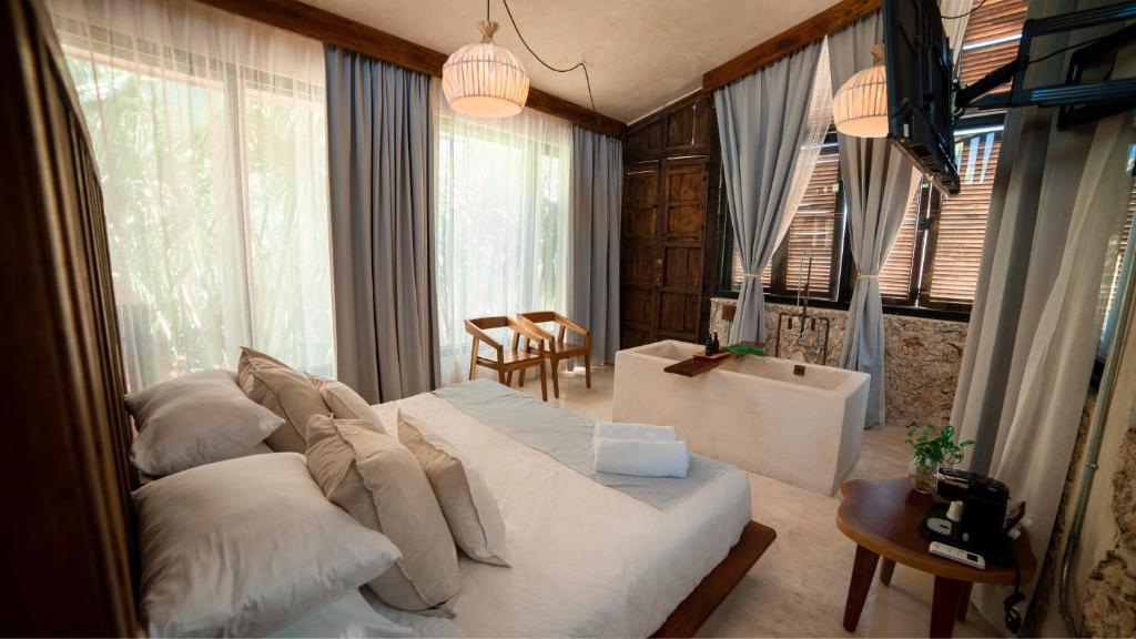 TV a/nebo společenská místnost v ubytování Japoneza Retreat Centro
