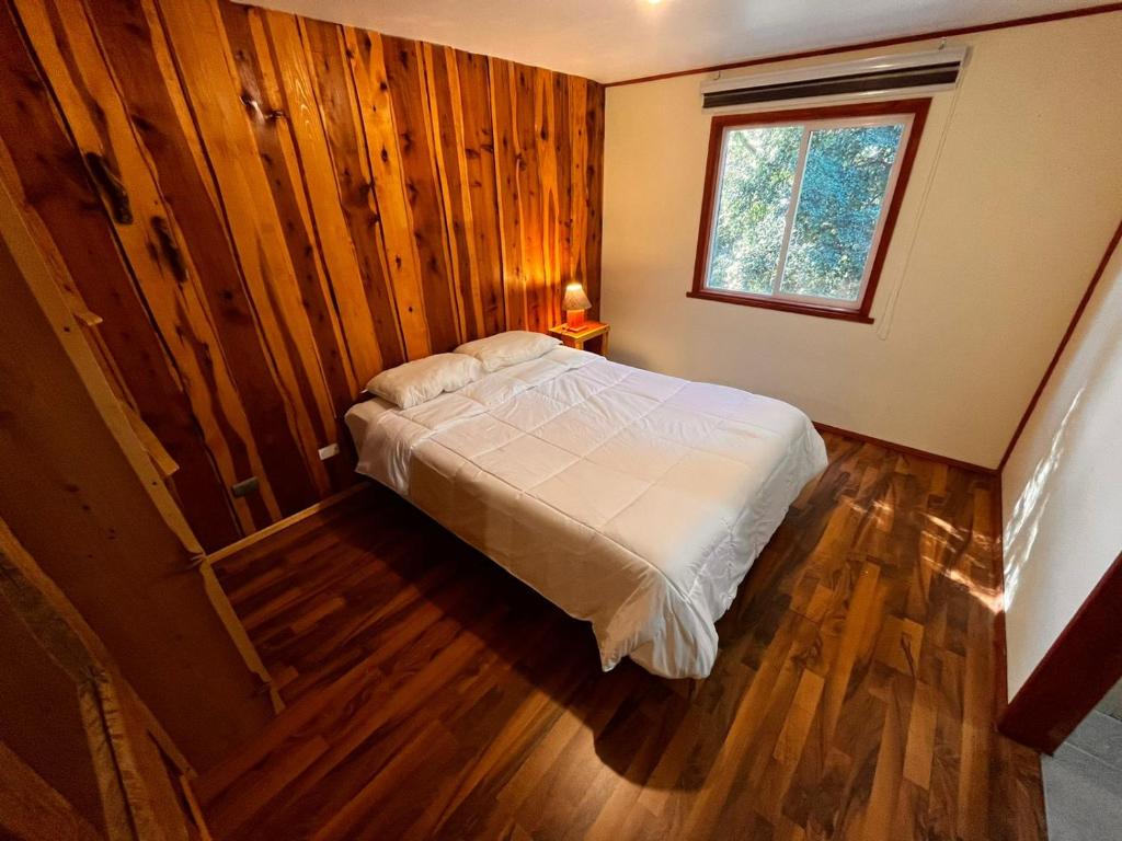 Postel nebo postele na pokoji v ubytování Ruka Pucón Hostel