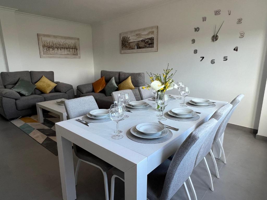A seating area at Apartamentos Maria de Lucia- Ático