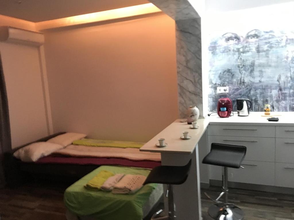 Kuchyň nebo kuchyňský kout v ubytování Apartment Center Piraeus location Kastella Passalimani Port