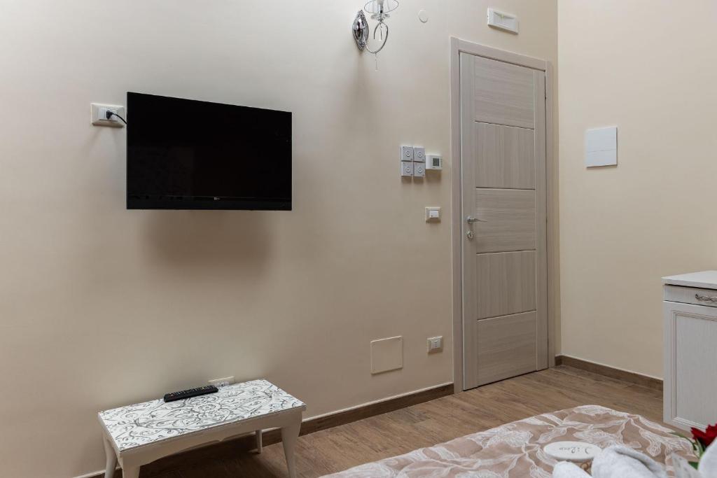 A television and/or entertainment centre at AGORA' Castelnuovo della Daunia