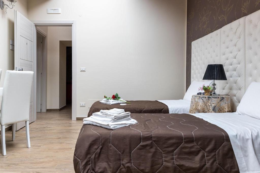 A bed or beds in a room at AGORA' Castelnuovo della Daunia