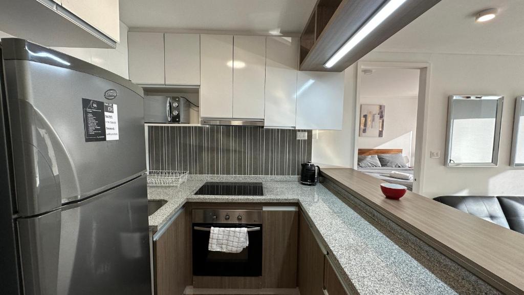 Kuchyň nebo kuchyňský kout v ubytování Apart Hotel Castellon 176