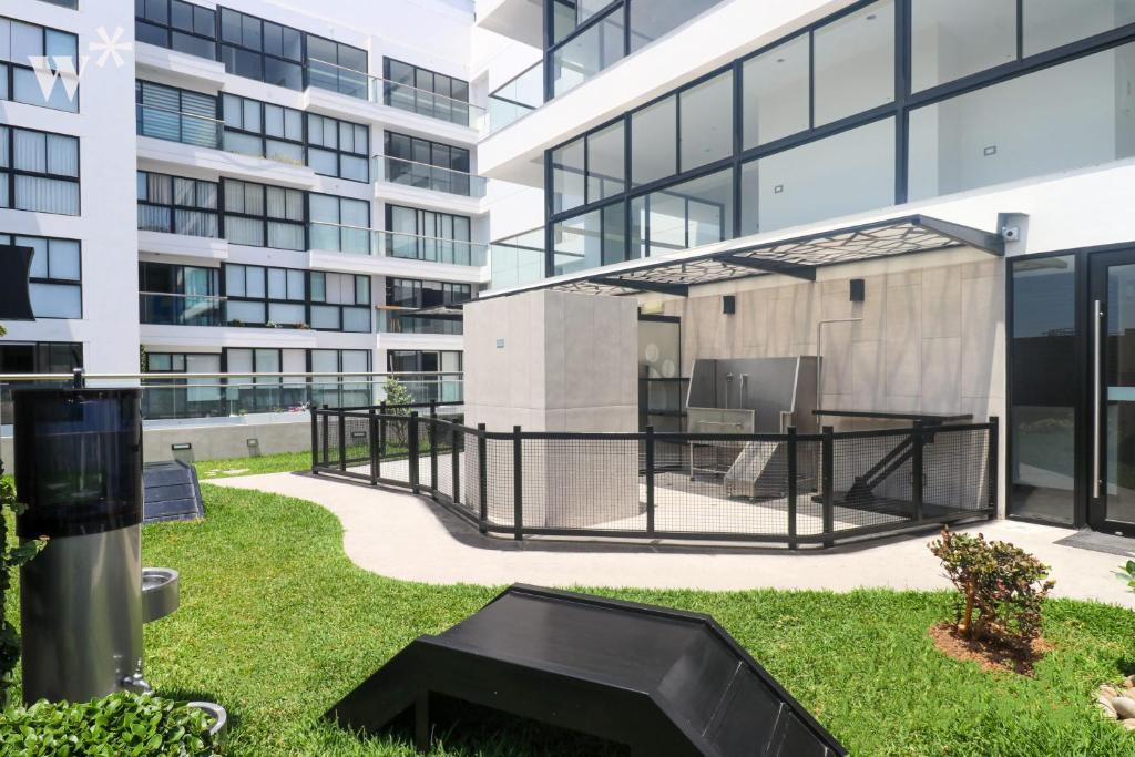 a view of the courtyard of a building at Navarrete Residence in Premium San Isidro by Wynwood House in Lima