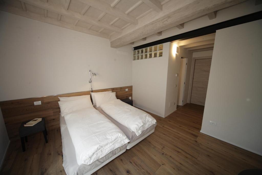 Posteľ alebo postele v izbe v ubytovaní 32 BnB Camerecaffè
