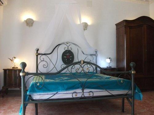 A bed or beds in a room at B&B Vittoria Colonna
