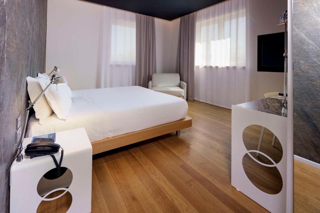 Postel nebo postele na pokoji v ubytování Best Western Plus Hotel Bologna