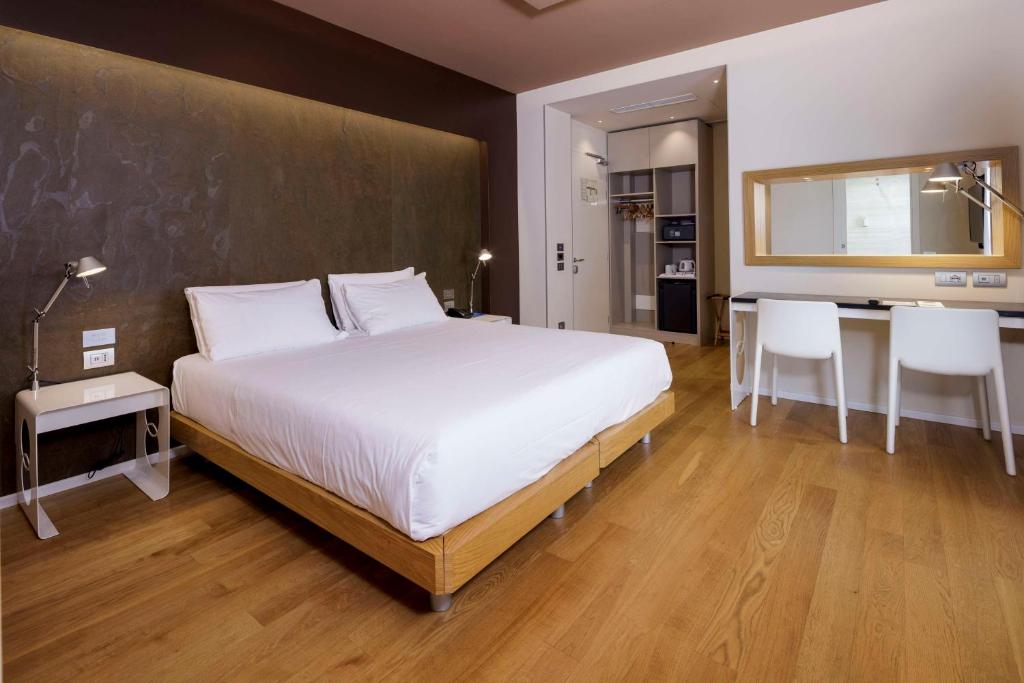 Postel nebo postele na pokoji v ubytování Best Western Plus Hotel Bologna