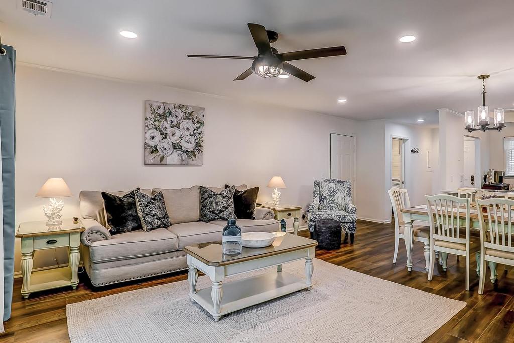 a living room with a couch and a table at Beckenham 209 in Hilton Head Island