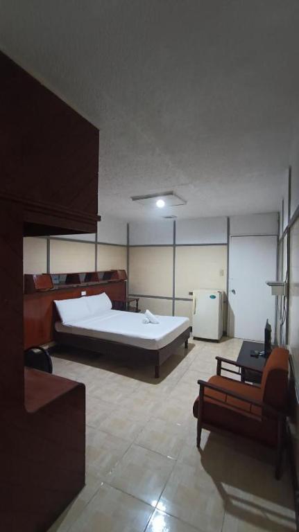 Postel nebo postele na pokoji v ubytování 2 Hotel Saleh