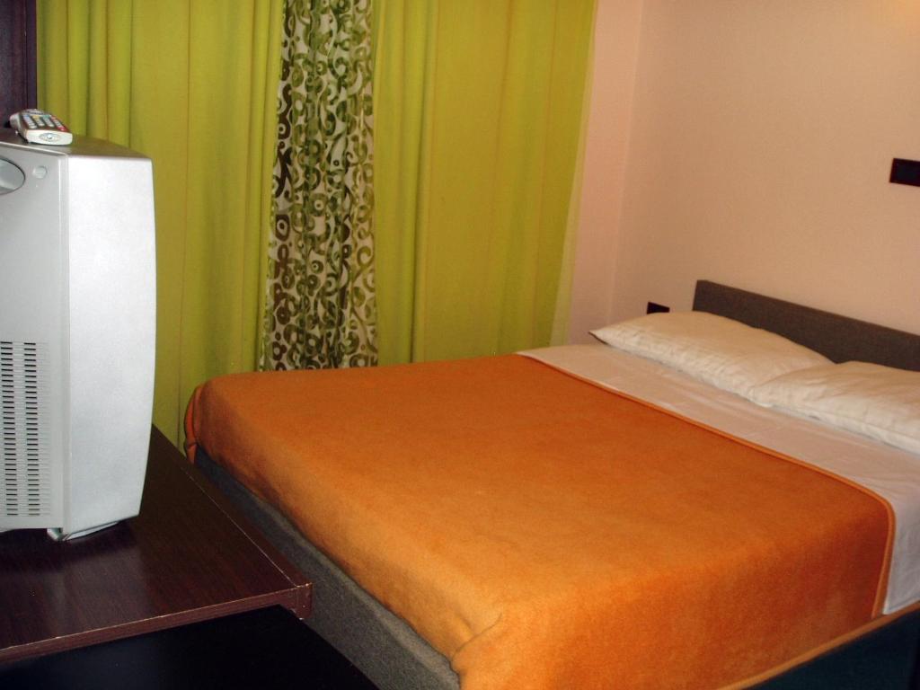 Postel nebo postele na pokoji v ubytování Hotel Zephyr - Plovanija