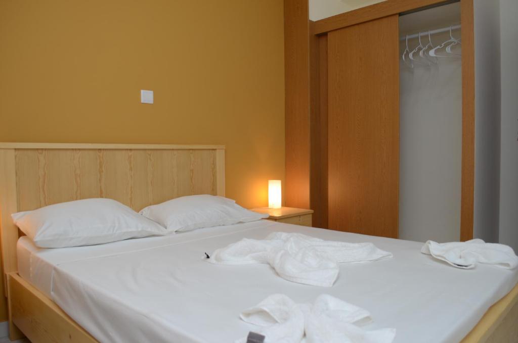 Postel nebo postele na pokoji v ubytování LT Aparthotel