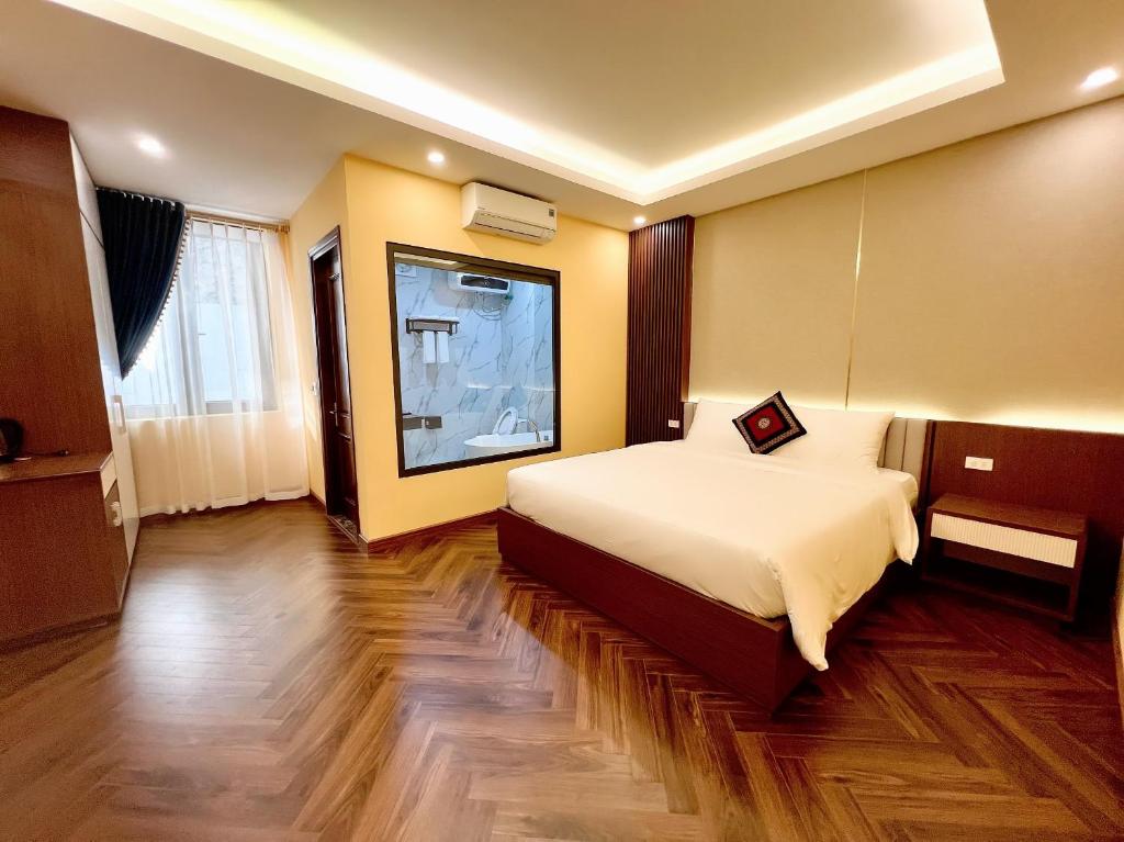 Postel nebo postele na pokoji v ubytování An Khang Hotel Sapa