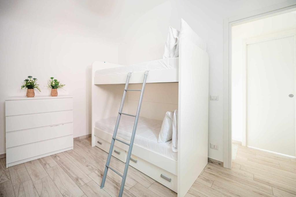 A bed or beds in a room at White Amalfi Centro Storico by ItalianHost