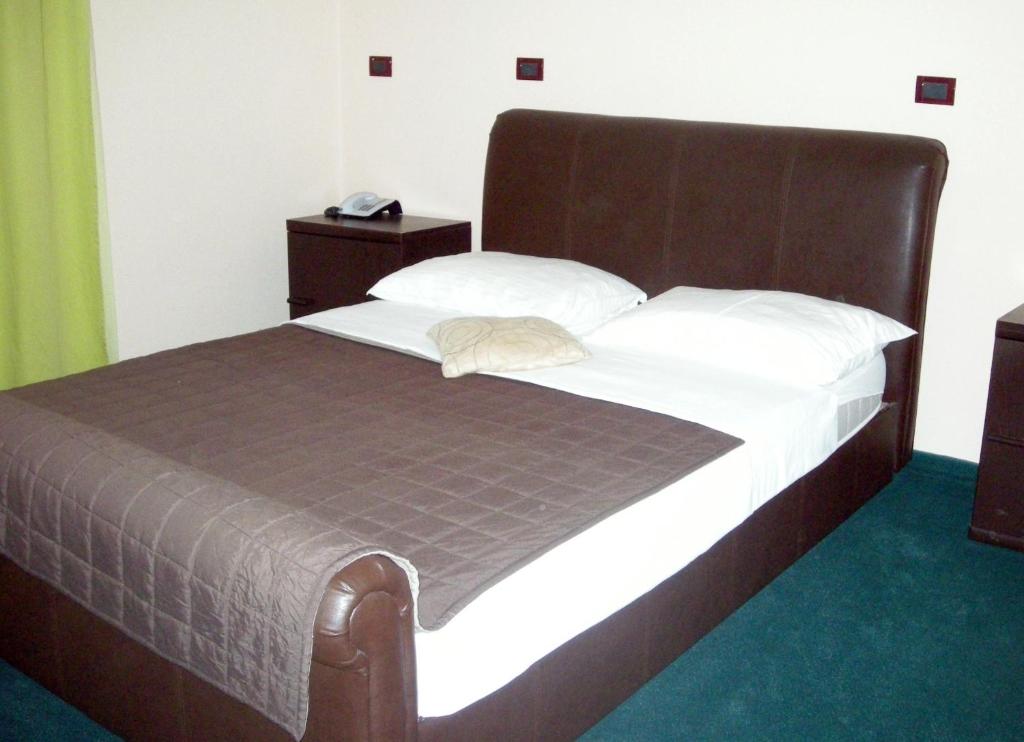 Postel nebo postele na pokoji v ubytování Hotel Zephyr - Plovanija