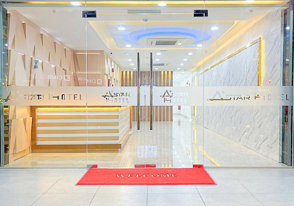 a lobby with a red carpet in a building at Astar Hotel Bukit Bintang in Kuala Lumpur