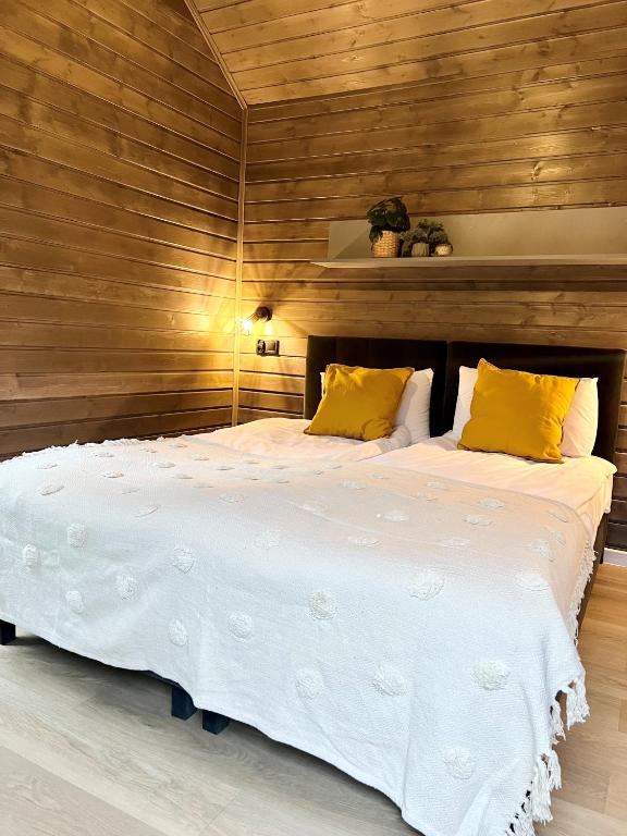 Postel nebo postele na pokoji v ubytování Ustronie Park - beach resort