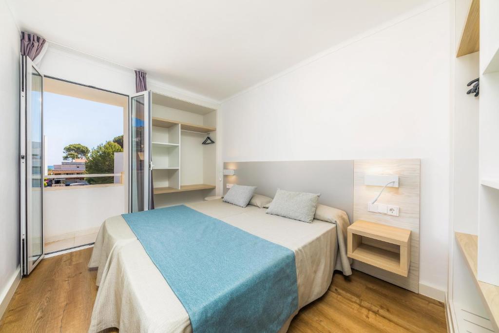 Posteľ alebo postele v izbe v ubytovaní Apartament Massanet 2b
