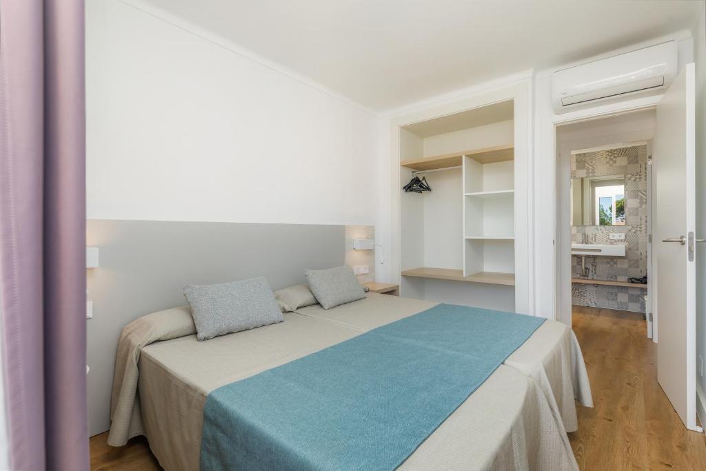 Posteľ alebo postele v izbe v ubytovaní Apartament Massanet 2b