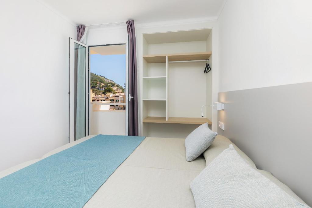 Posteľ alebo postele v izbe v ubytovaní Apartament Massanet 2b