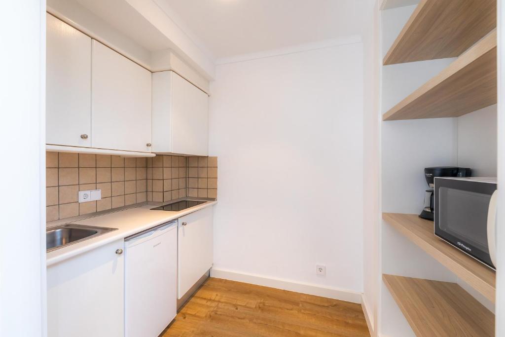 Kuchyňa alebo kuchynka v ubytovaní Apartament Massanet 2b