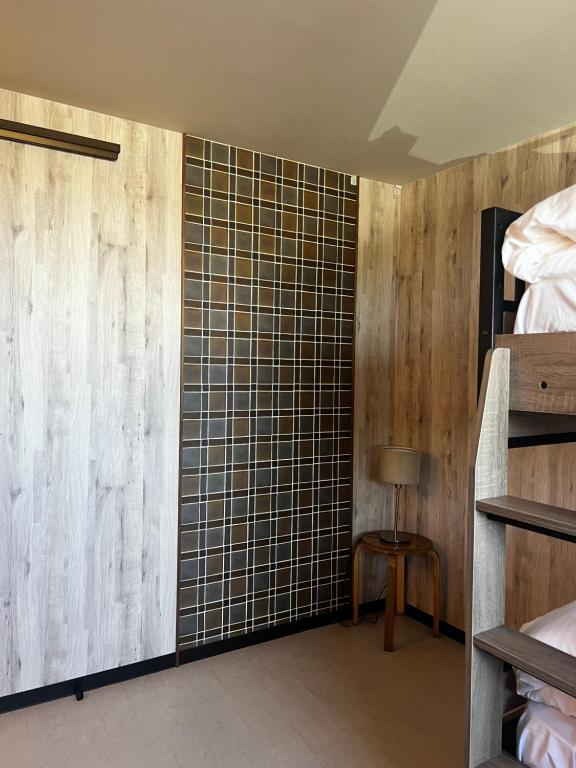 Postel nebo postele na pokoji v ubytování KIIIYA cafe&hostel